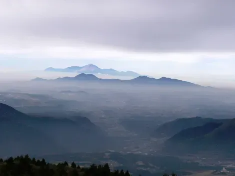 The summits of the Aso caldera, seen from Kusasenri.