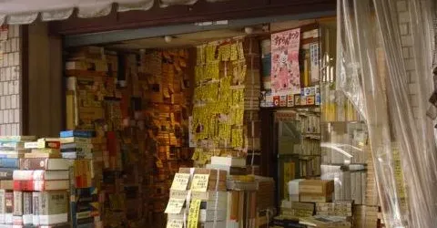 Under the mountains of books, bookstore Tamura Kanda offers books in French.