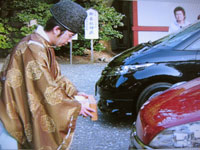 Blessing a car in Tomioka Hachimangu Shrine, Fukagawa, Tokyo.