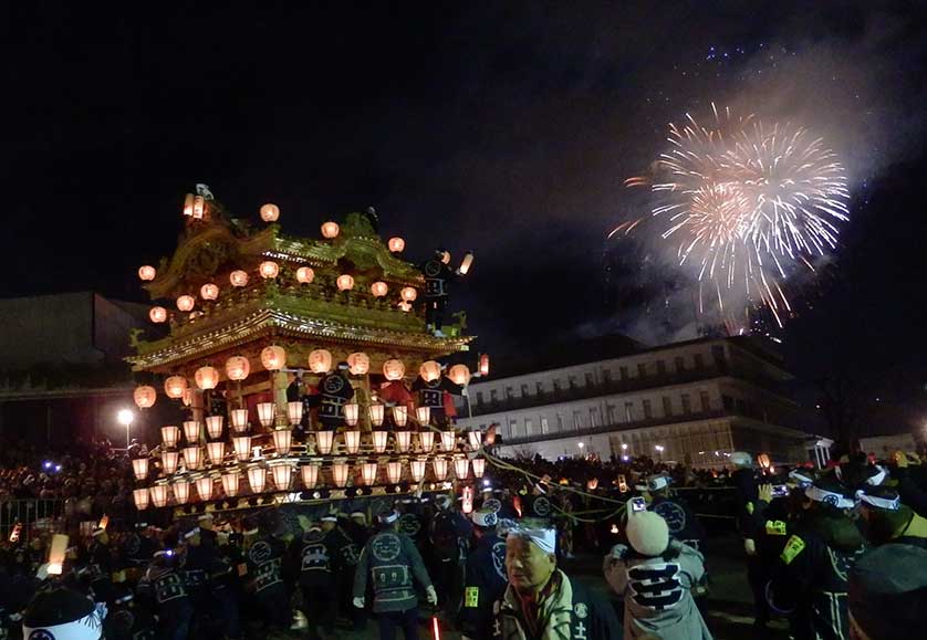 Festival float with fireworks in the background, Chichibu Night Festival.