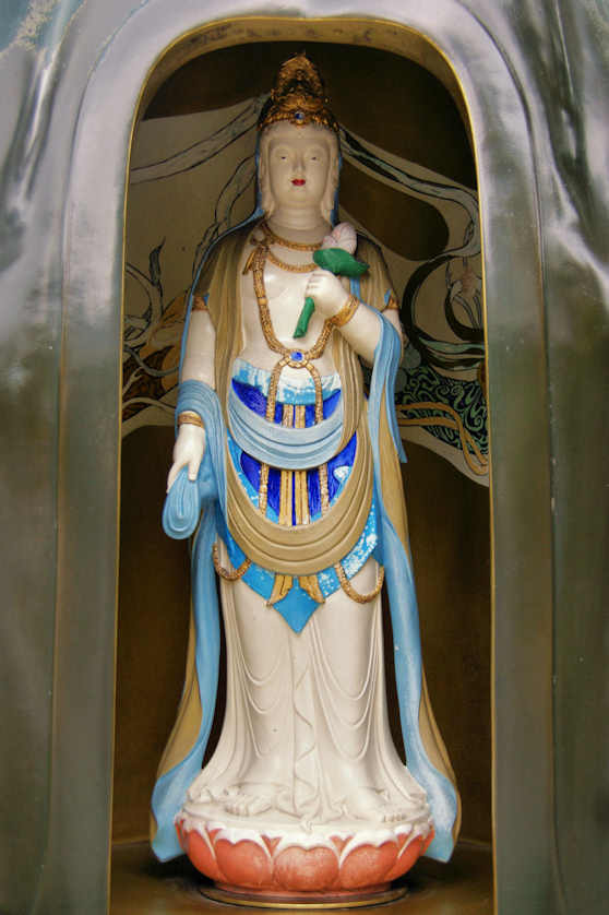 Unusual ceramic statue of Kannon in the grounds of Dainchiji Temple, Shikoku.