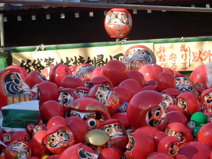 Discarded daruma dolls at Kitain, Kawagoe, Saitama.