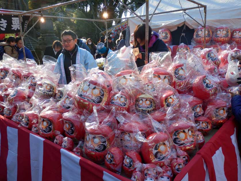 Discarded daruma dolls at Kitain, Kawagoe, Saitama.