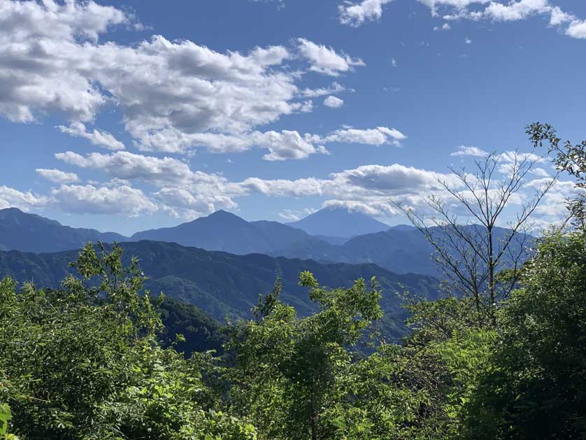 Distant view of Mt. Fuji from Mt. Takao.