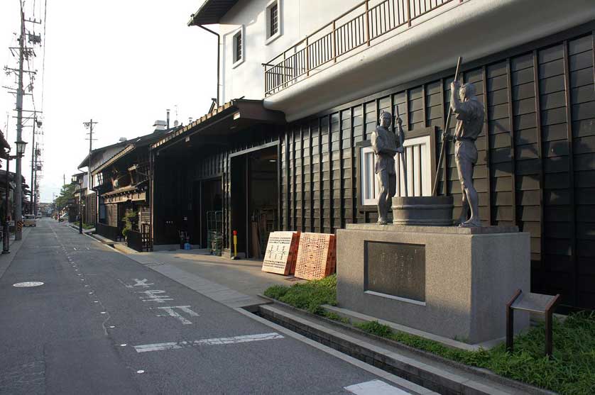Monument to early sake brewers, Hida-Furukawa, Gifu Prefecture.