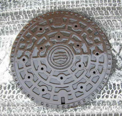 Hiroshima manhole cover in the snow, Hiroshima Prefecture