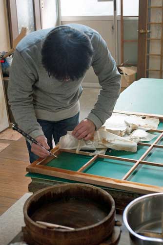 Making Fusuma, traditional sliding, paper doors in Osaka.