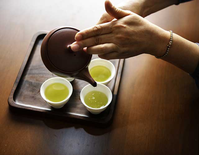 Grinding matcha green tea.