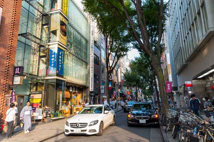 Traffic on main street of Kagurazaka, Tokyo.