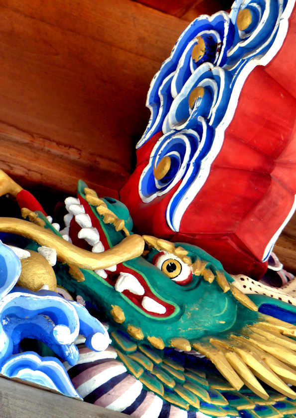 Restored relief carving on the main hall of Kannonji Temple, Shikoku.