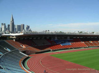 National Stadium Tokyo with Shinjuku Skyscrapers.