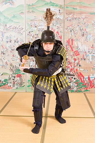 Visitors try on samurai armour in Sekigahara.