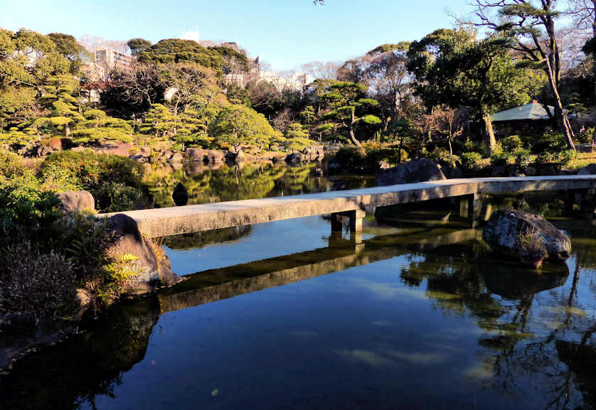 One of the bridges across the pond in Keitakuen Garden.