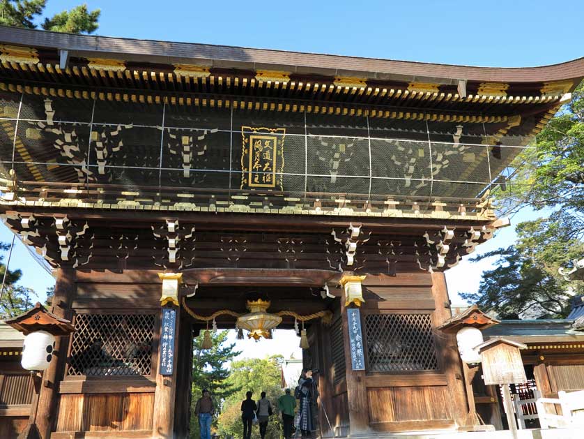 Entrance gate to the inner shrine grounds, Kitano Tenmangu Shrine, Kyoto.