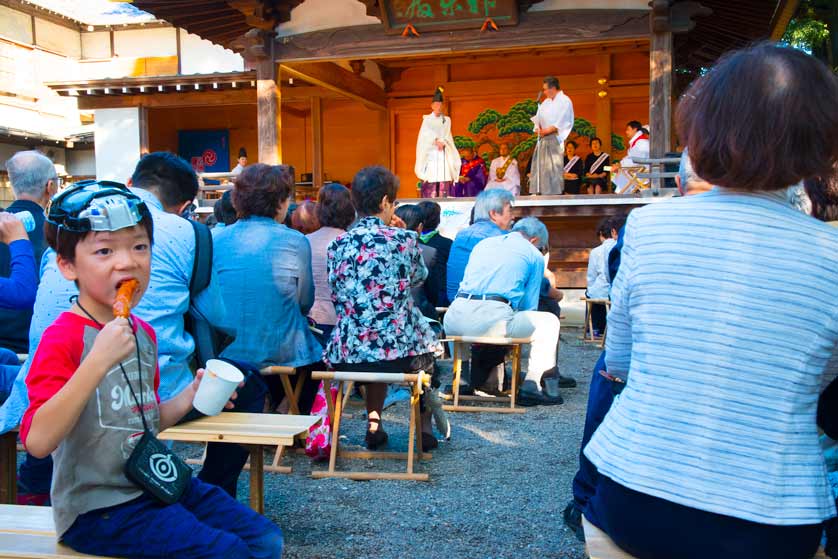 Watching a traditional Japanese stage ritual at the Kitazawa Hachiman Shrine Festival, Setagaya ward, Tokyo.