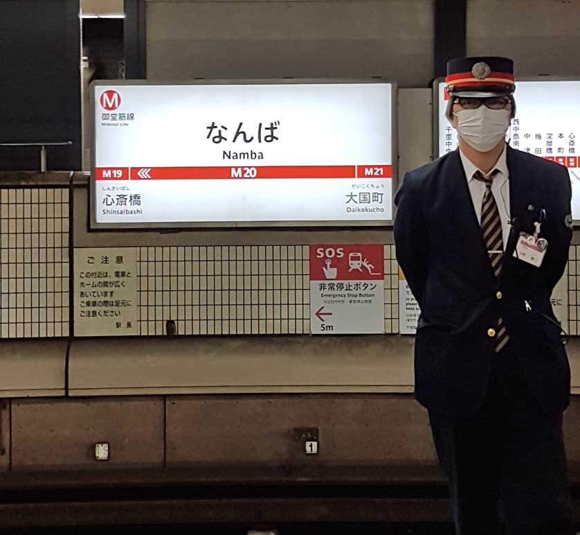 Platform attendant at Namba Station, Osaka.