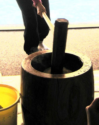 Pounding rice to make mochi, Japan.