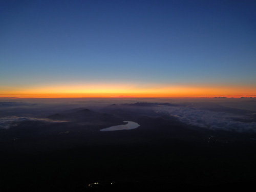 A spectacular sunrise from the summit of Mt Fuji, Japan.