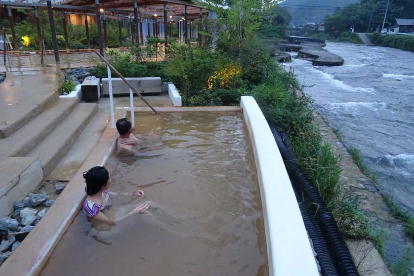 Bathing along the river in Nagayu.