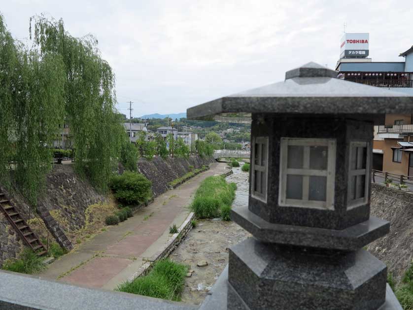 Bridge with lantern over the Yotsume River, Gifu Prefecture.