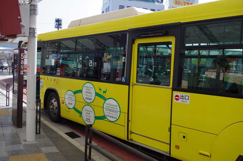 Yellow Nara Loop Bus at Nara Station, Japan.