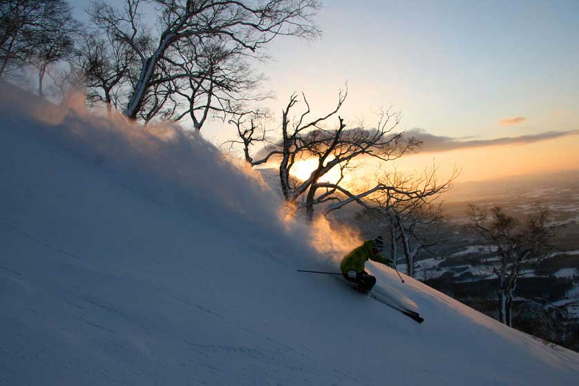 Skiing at Niseko Village, Hokkaido, Japan.