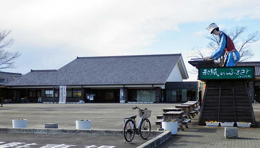 Sculpture of a traditional paper maker in front of the Saitama Craft Center, Ogawa, Saitama Prefecture, Japan.