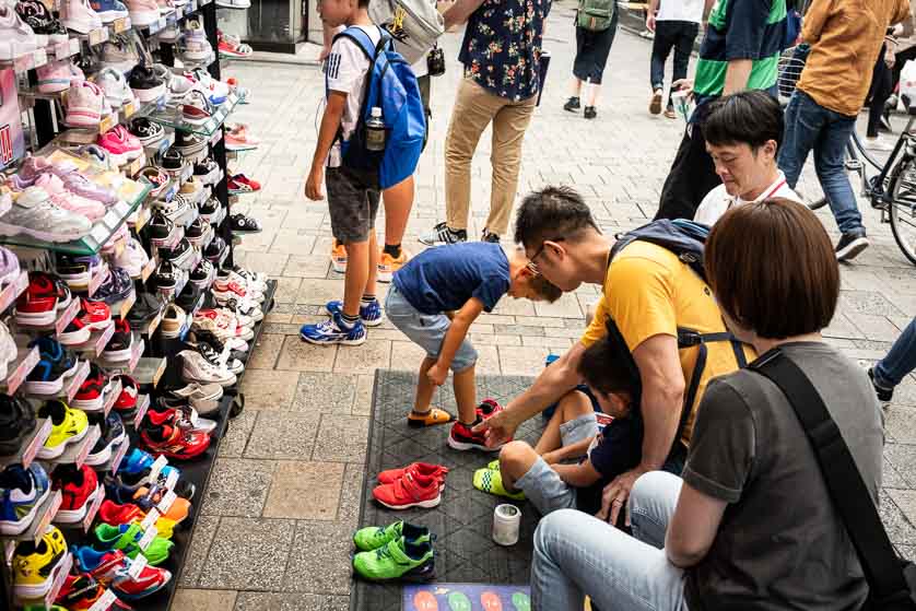 Buying shoes in Okachimachi.
