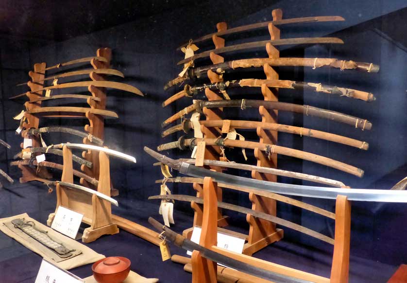 Samurai swords left as offerings at the shrine and on display in the museum.