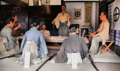 Saigo and his followers discuss defeat.