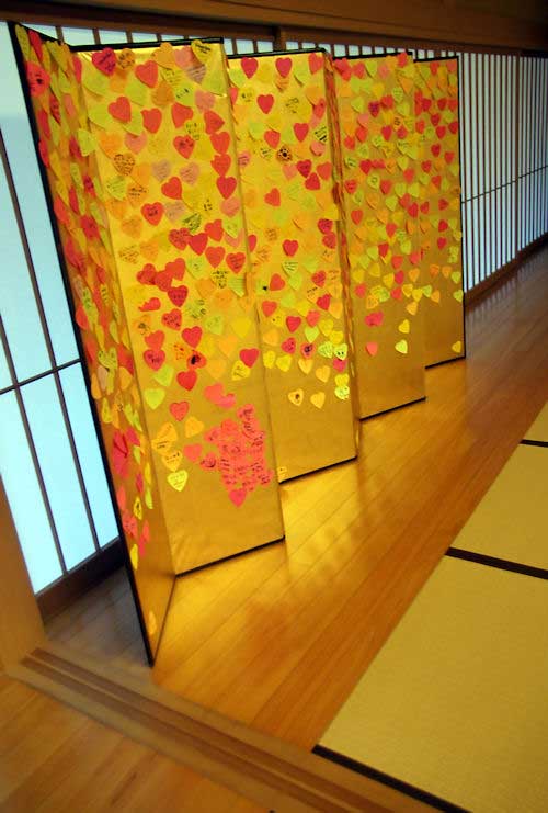 A folding screen exhibited in the huge second floor gallery of Saga Arashiyama Museum of Arts & Culture.