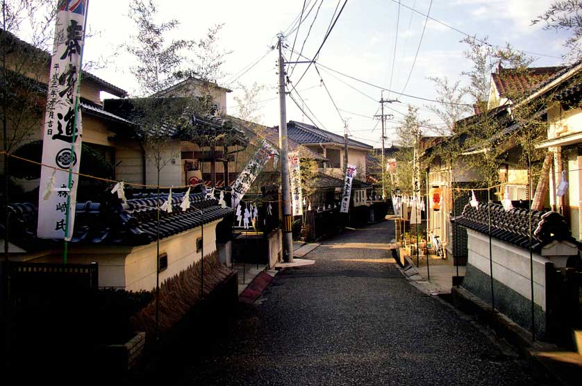 Streets lined with shimenawa in preparation for mikoshi procession in Tsunozu, Shimane.