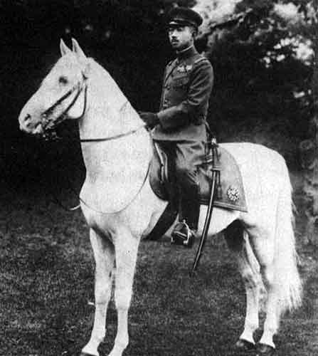 Japanese Emperor Hirohito riding his white stallion.