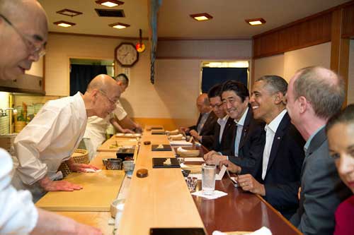 US President Barack Obama and Japanese Prime Minister Shinzo Abe dining at Sukiyabashi, Tokyo, Japan.