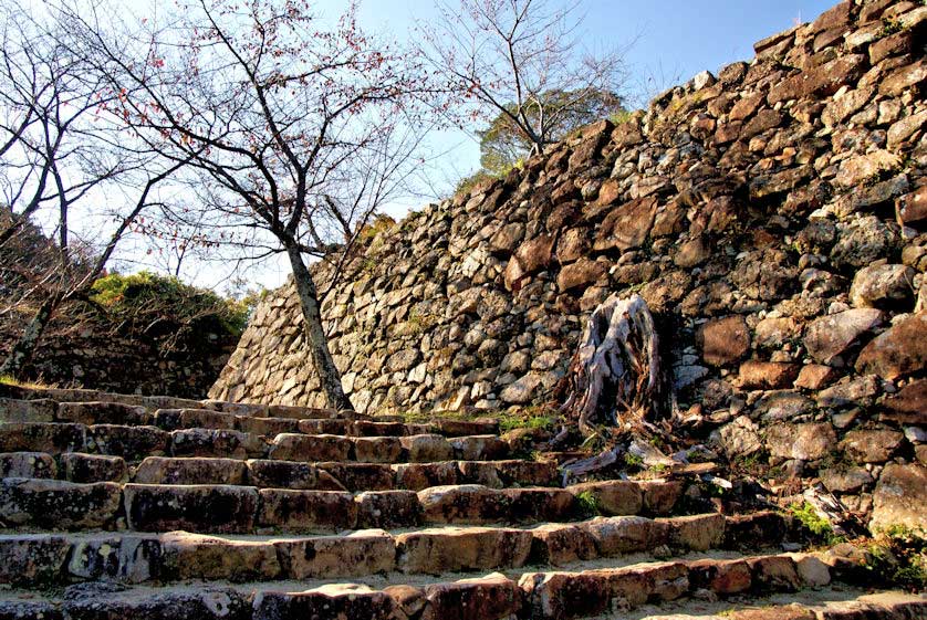 Signboard displaying the extensive stonework still existing at the Sumoto Castle ruins, Awaji, Hyogo Prefecture, Japan.