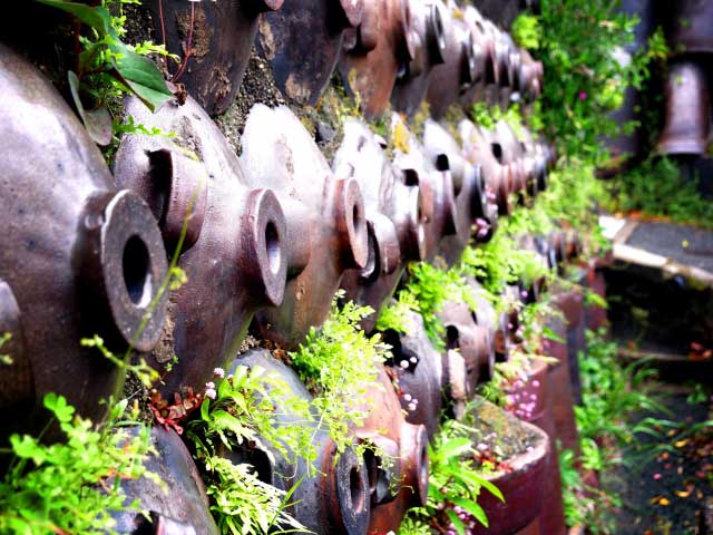 Tokoname wall built from shochu bottles.