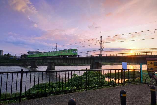 JR Train crossing the Uji River, Uji, Kyoto Prefecture.
