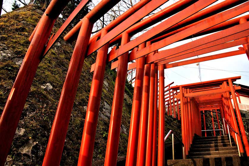 The way to an Inari Shrine at the eastern end of Usuki Castle Ruins Park.