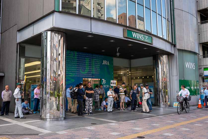 Waiting for WINS to open, Kinshicho, Sumida-ku, Tokyo.