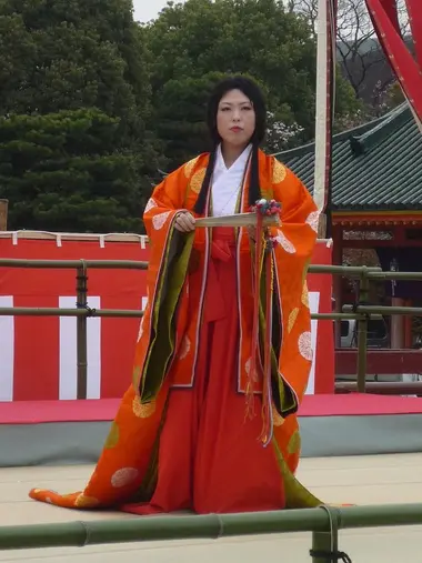 A miko, Shinto priestess.