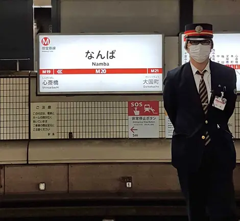 Platform attendant at Namba Station, Osaka Platform attendant at Namba Station, Osaka