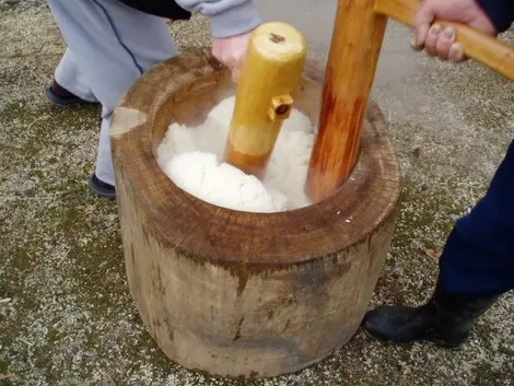 Making mochi, small balls of glutinous rice, made family for New Year.