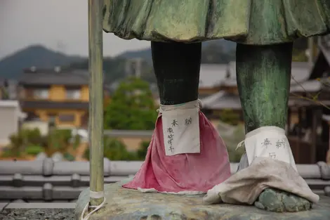 Pious statues punctuate the O-Henro, pilgrimage route of Shikoku Island Pious statues punctuate the O-Henro, pilgrimage route of Shikoku Island