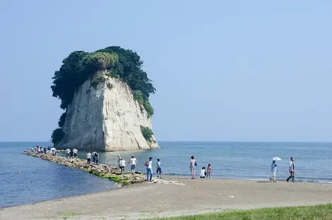 A small pebble path leads to the island of Mitsukejima A small pebble path leads to the island of Mitsukejima