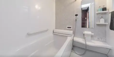 Japanese Style Bathroom, where we shower outside of the bathtub and then enter the bathtub once cleaned. Japanese Style Bathroom, where we shower outside of the bathtub and then enter the bathtub once clean.