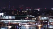 Fukuoka Airport International Terminal at night with Fukuoka City in the background