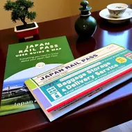 Voucher Japan Rail Pass on a table