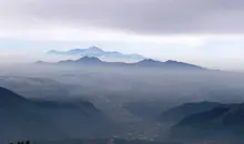 The summits of the Aso caldera, seen from Kusasenri.