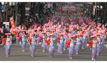 A group parading the streets of Fukuoka