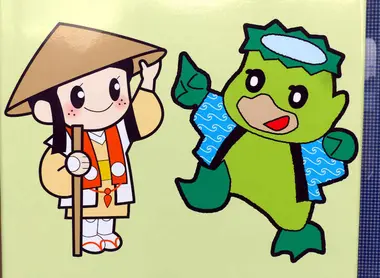 The white-clad pilgrim mascot